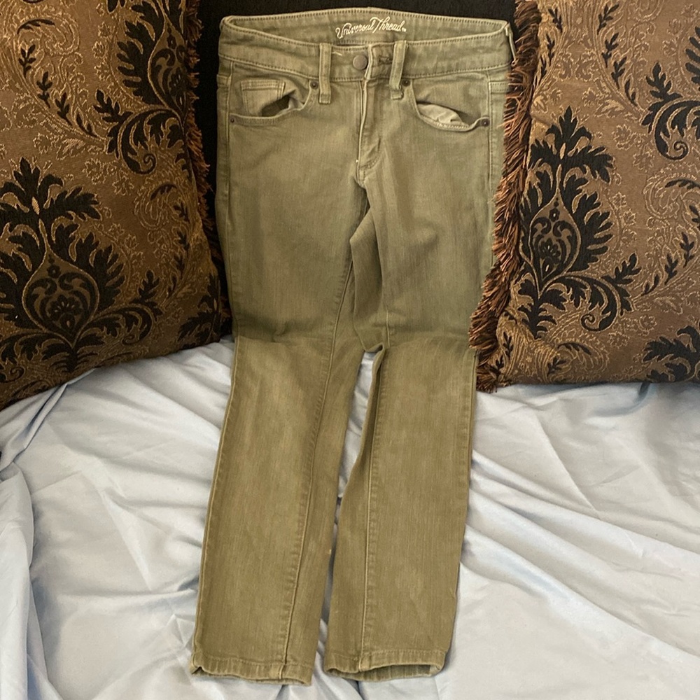 Green mid rise skinny jeans in women with the size 00/24R brand universal thread
